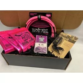 The Ernie Ball & D’Addario Pink Guitar Player Gift Bundle